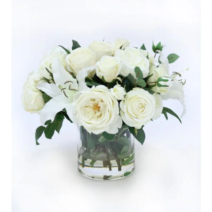 Roses and Casablanca Lilies by Distinctive Designs