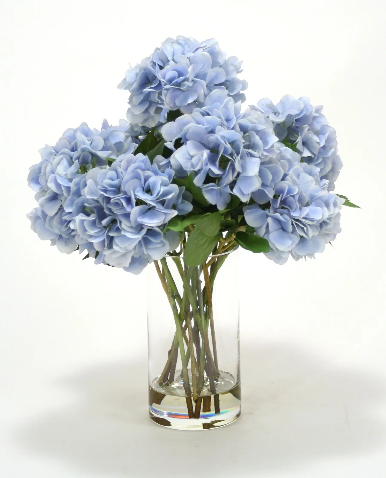 Blue Silk Hydrangeas in Glass Cylinder by Distinctive Designs